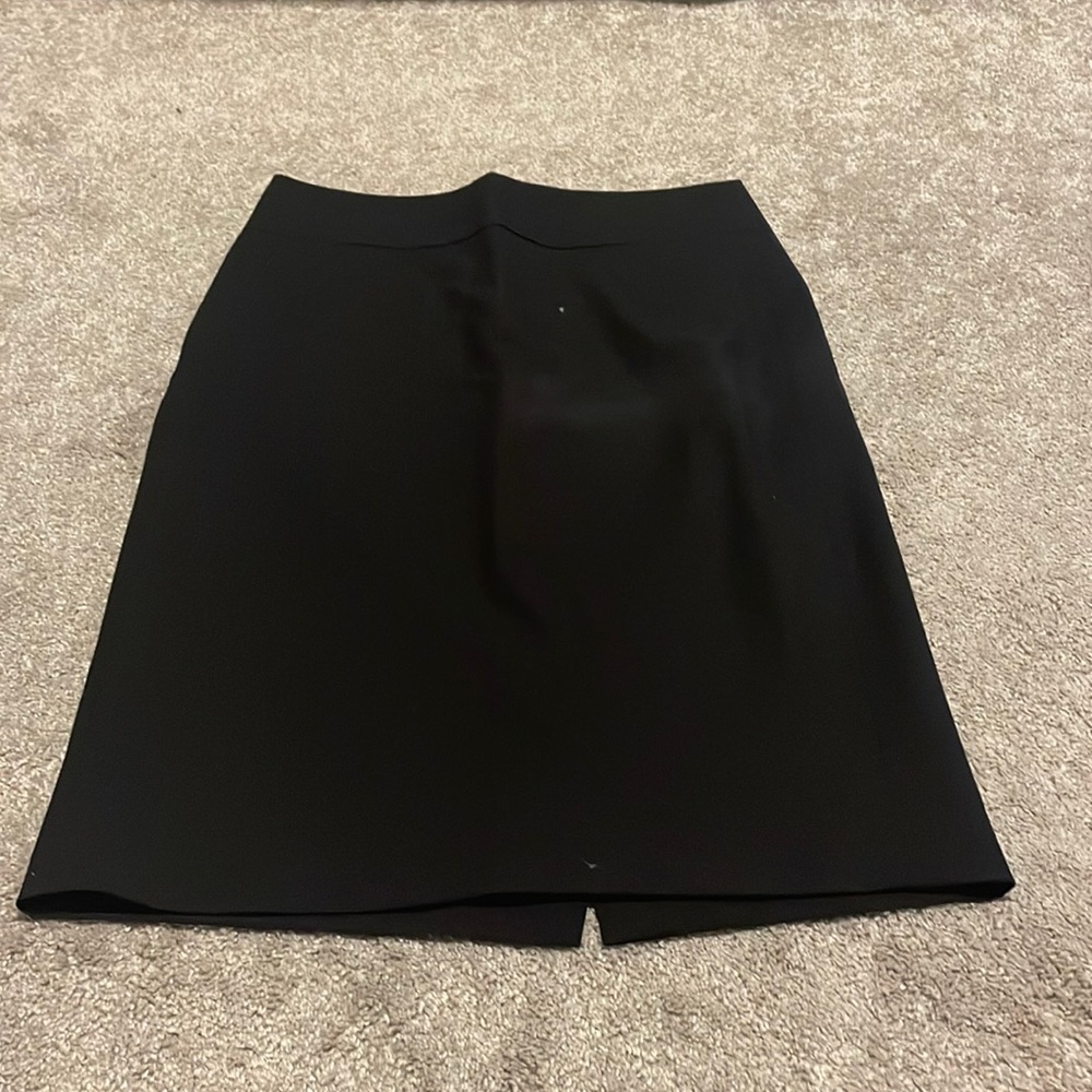 Black suiting skirt that no longer fits me!  Looking for a good home!